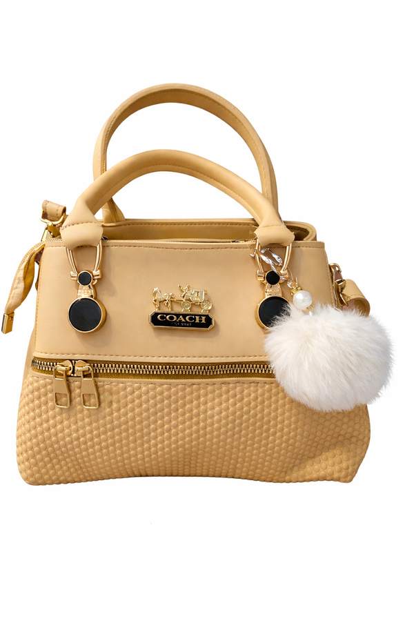 Luxury Beige Mini Handbag with Pom Pom Charm